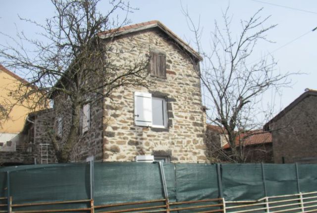 Maison en pierres avec jardin